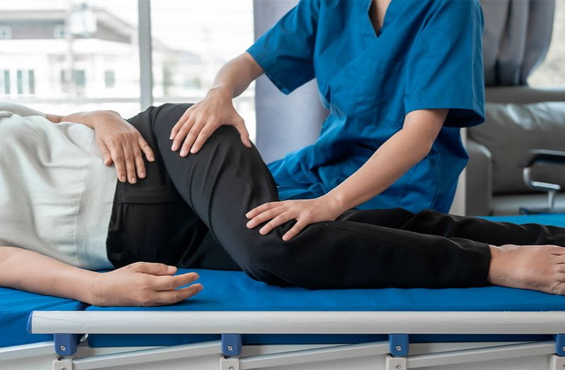 A chiropractic professional provides targeted hip and lower-back therapy to relieve tension, improve alignment, and restore comfortable movement